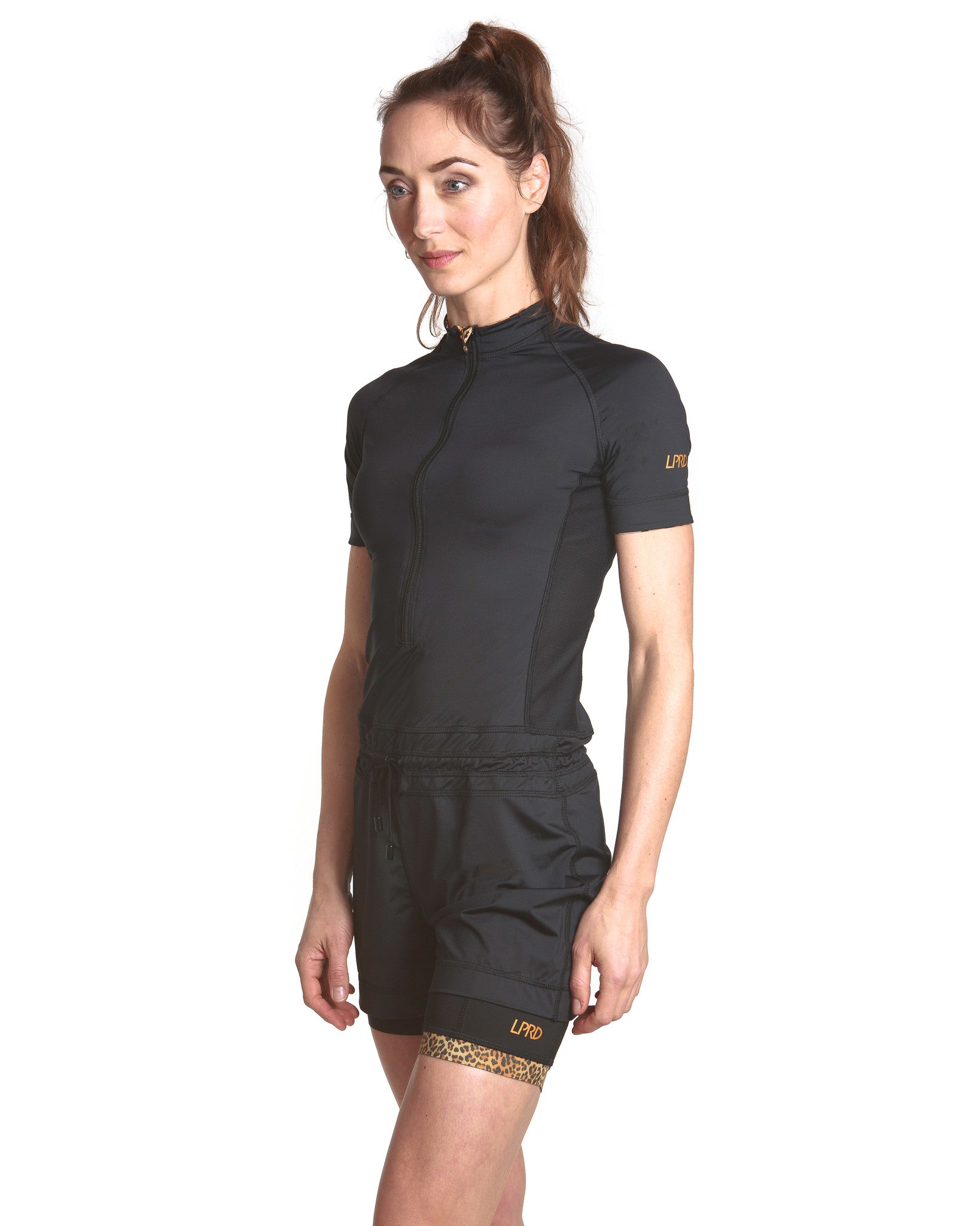 LPRD Black Onesie Jumpsuit | Close-up side view with black cycling shorts